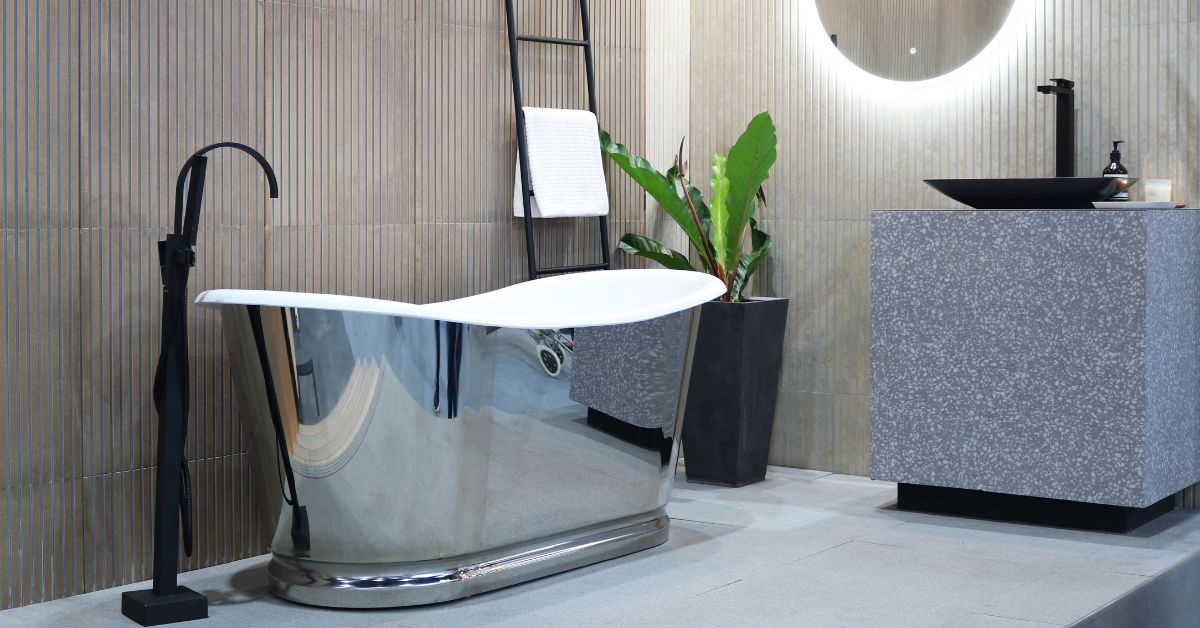 standing steel bath in a modern bathroom